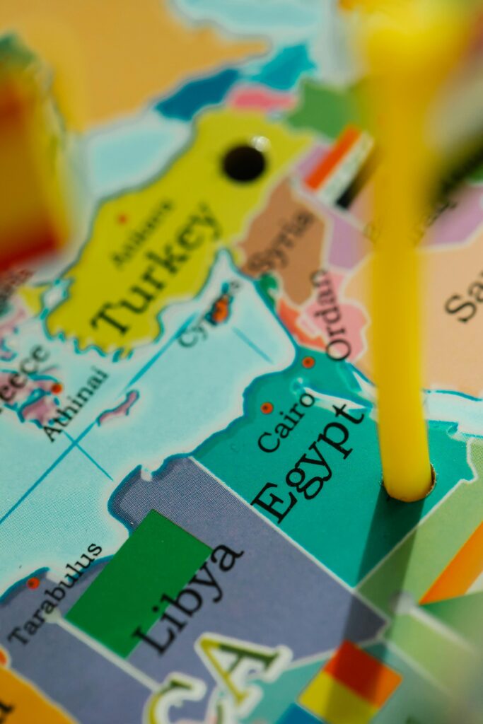 Close-up of a colorful world map highlighting Egypt and surrounding countries. Close-up of a colorful world map highlighting Egypt and surrounding countries.